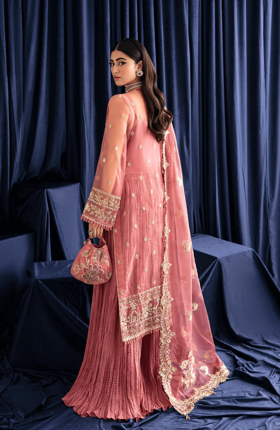 MEHAK Back view of pink A-line dress with a zip-up closure and softly pleated skirt for a feminine and polished look | Fabiha Fatima