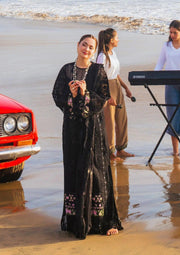 Mahnoor a black dress filled with luxury from ELAF's 'HAI KUCH' Festive 2024 Collection.