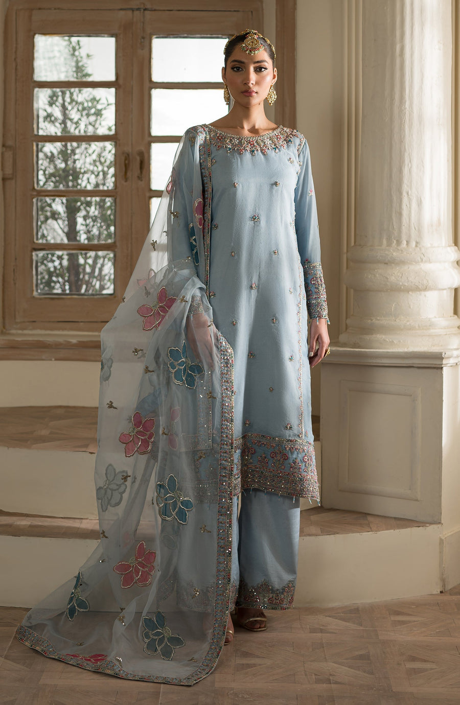 formal dress with feathers