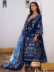 Woman wearing a blue embroidered traditional outfit with a matching dupatta.