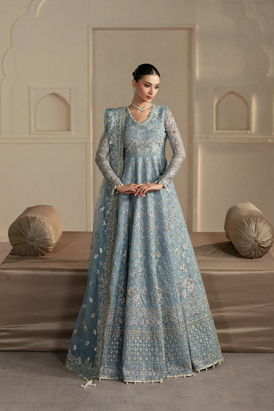 Woman in a light blue embroidered traditional outfit by Ayzel. Collection name is Pehli nazar and article name is Fursat