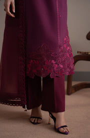 Person wearing a burgundy outfit with floral lace details on a neutral background| Elvin Collection by fabiha fatima