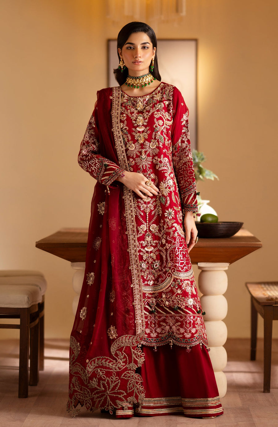 traditional red dress with gold and silver embroidery